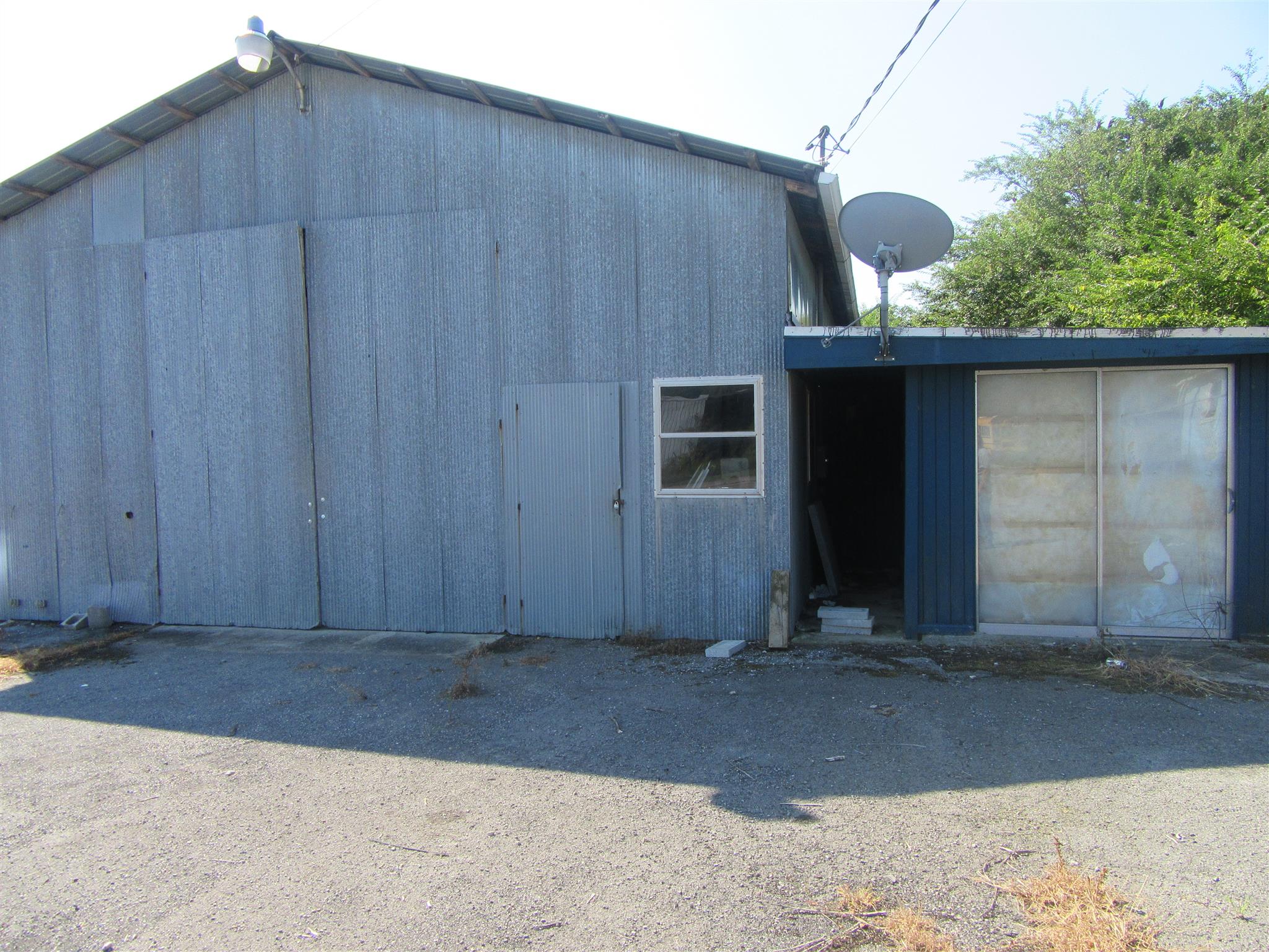 902 Trussell Road Monteagle, TN 37356 - Photo 18 of 23 Behind the house storage building 30x60 with attached office with full kitchen and full bath
