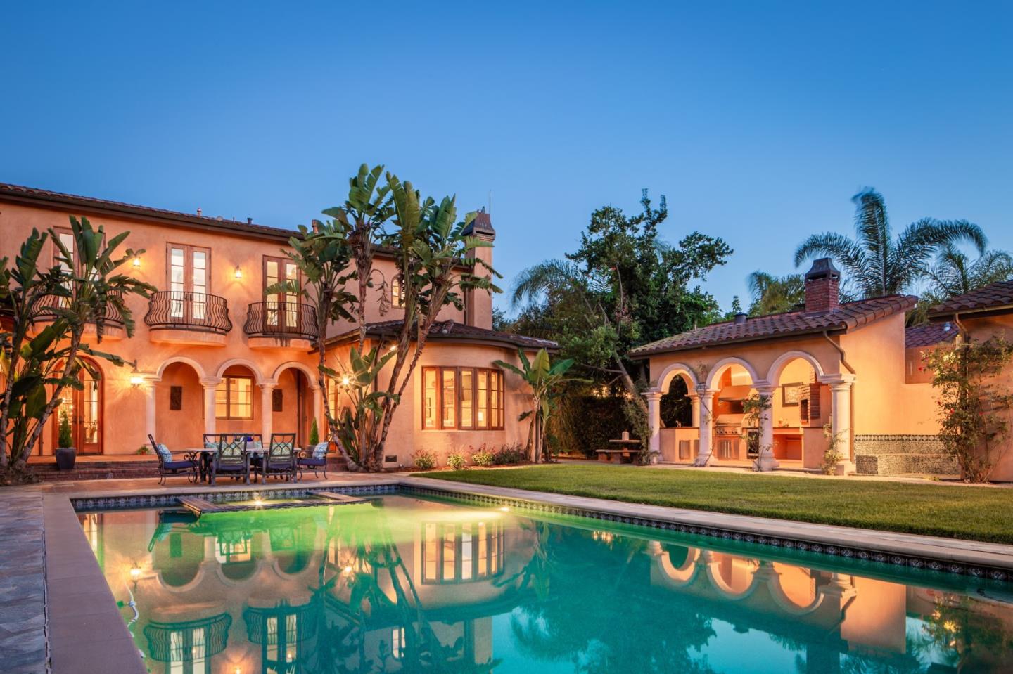 a view of swimming pool with outdoor seating