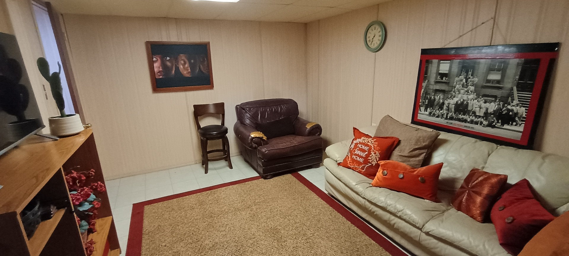 18751 Kings Road Homewood, IL 60430 - Photo 28 of 35 a living room with furniture and a flat screen tv