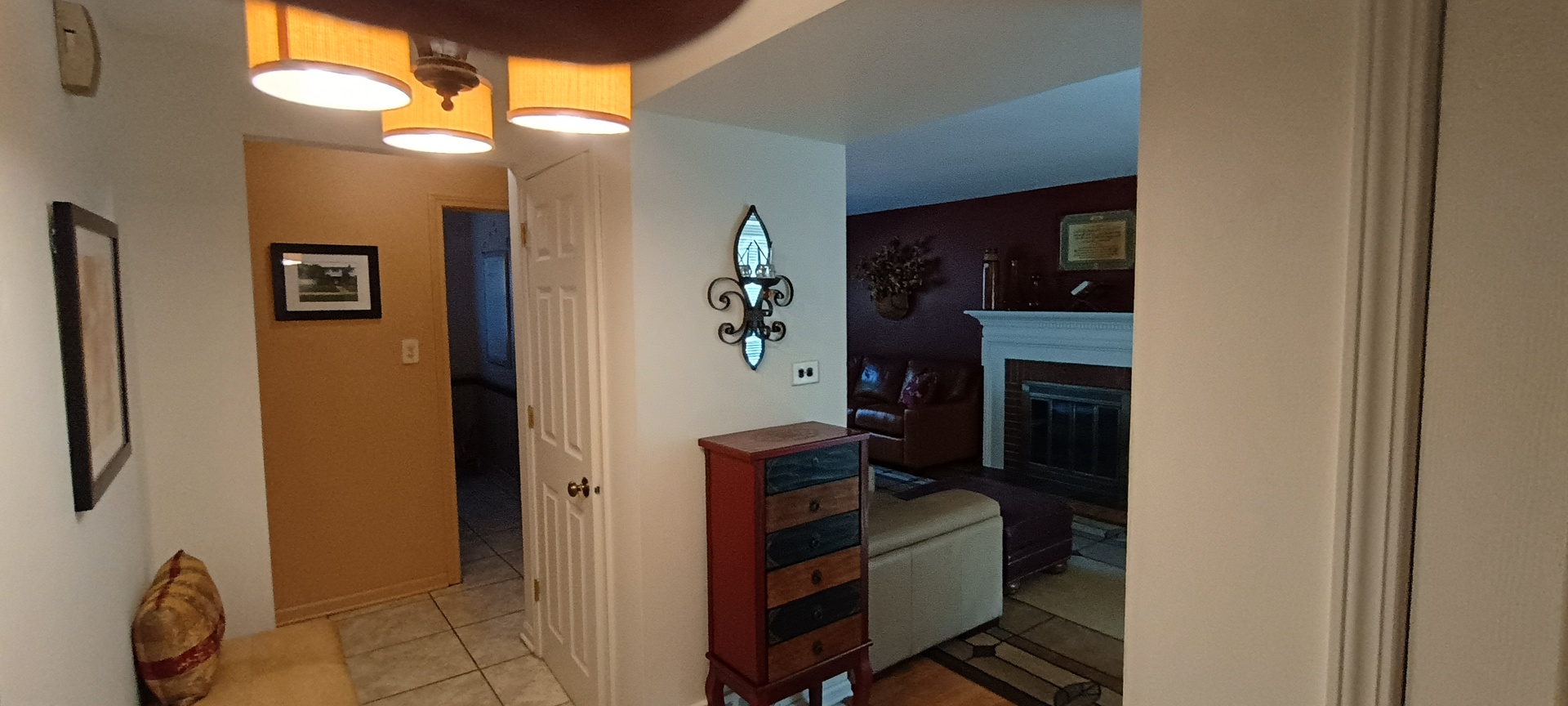 18751 Kings Road Homewood, IL 60430 - Photo 3 of 35 a view of workspace with wooden floor cabinet and a mirror