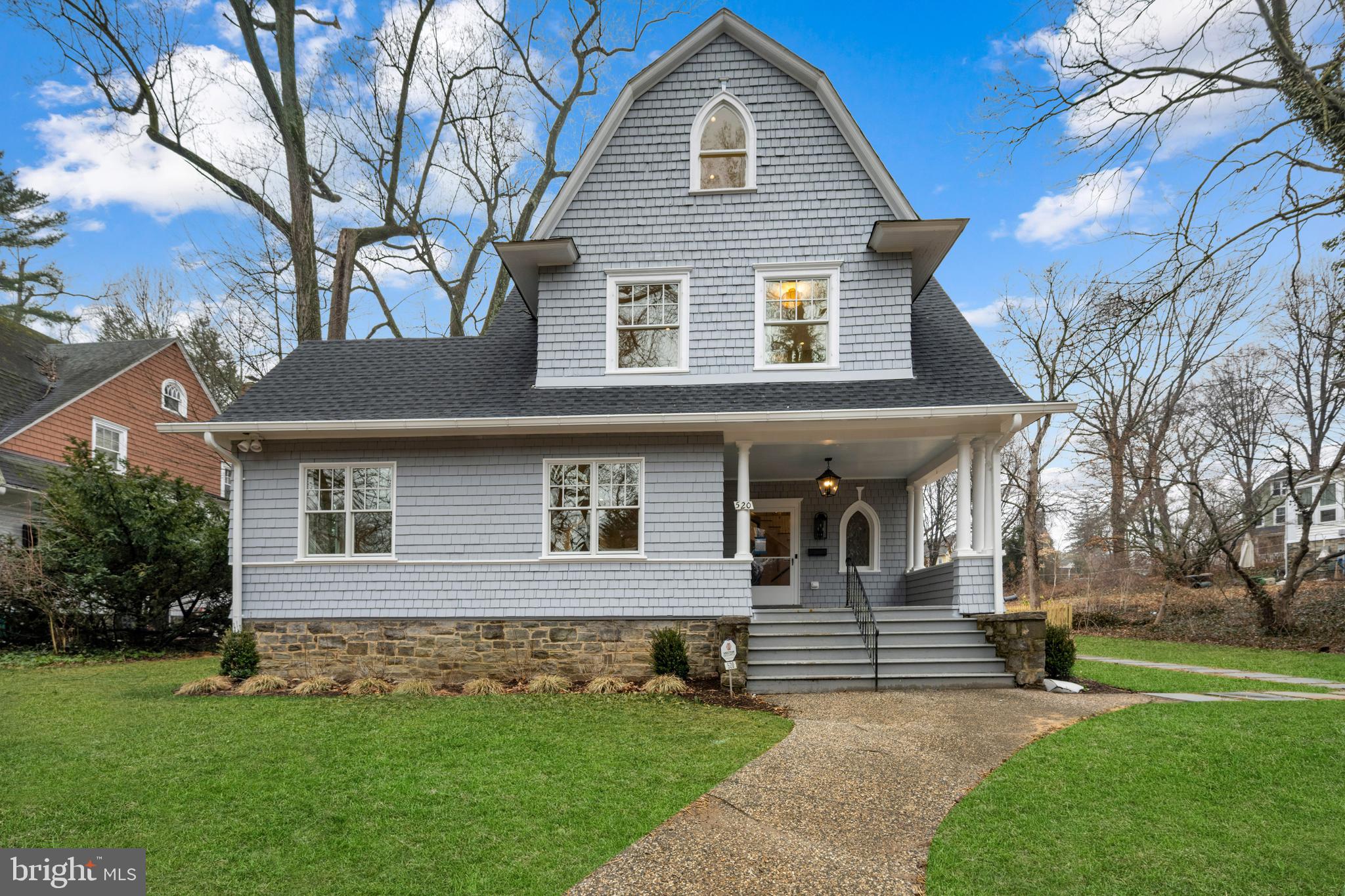 520 Woodlawn Road Baltimore, MD 21210 - Photo 1 of 39 a front view of a house with a garden