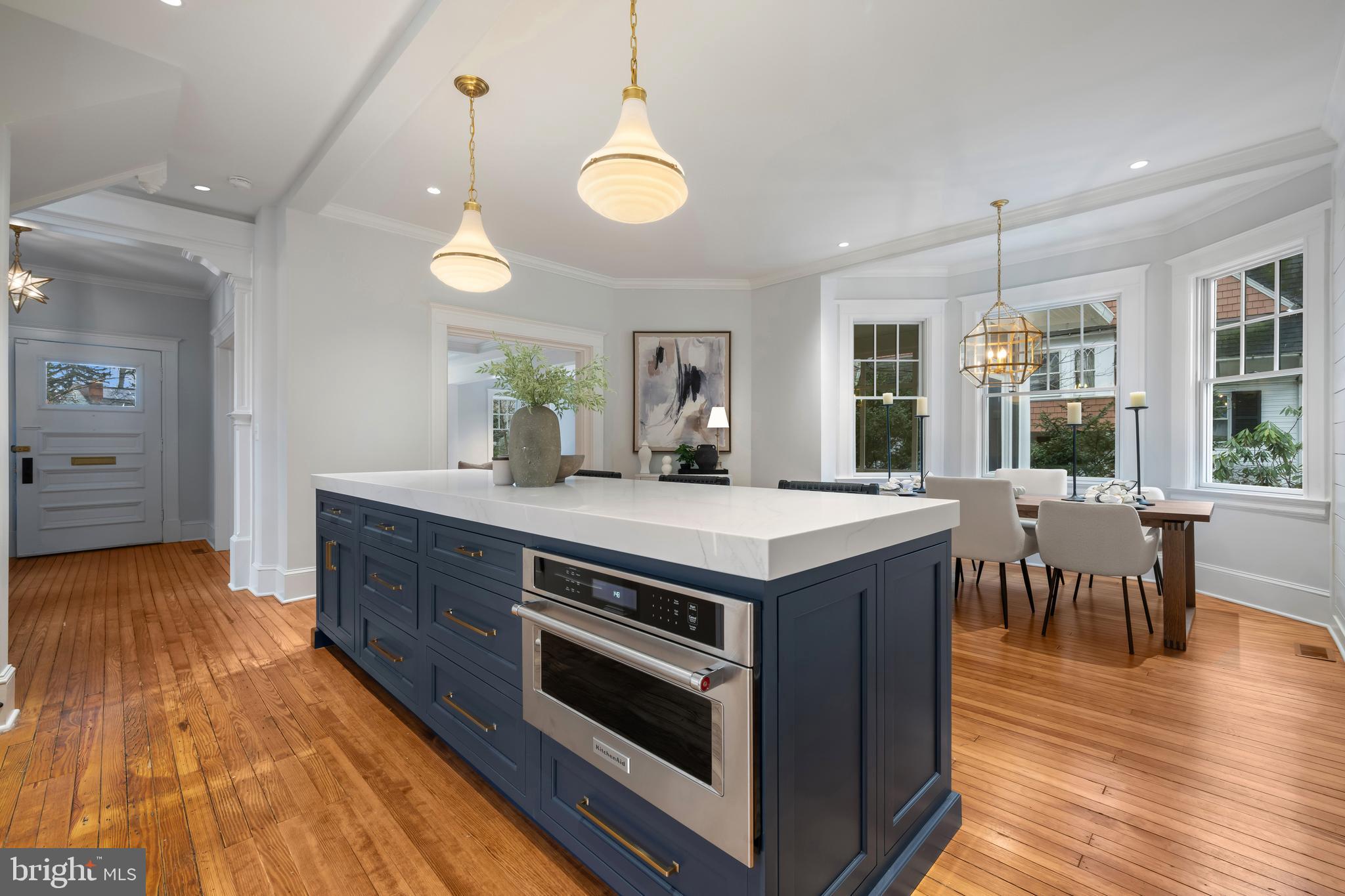 520 Woodlawn Road Baltimore, MD 21210 - Photo 11 of 39 a kitchen with a stove and wooden floor
