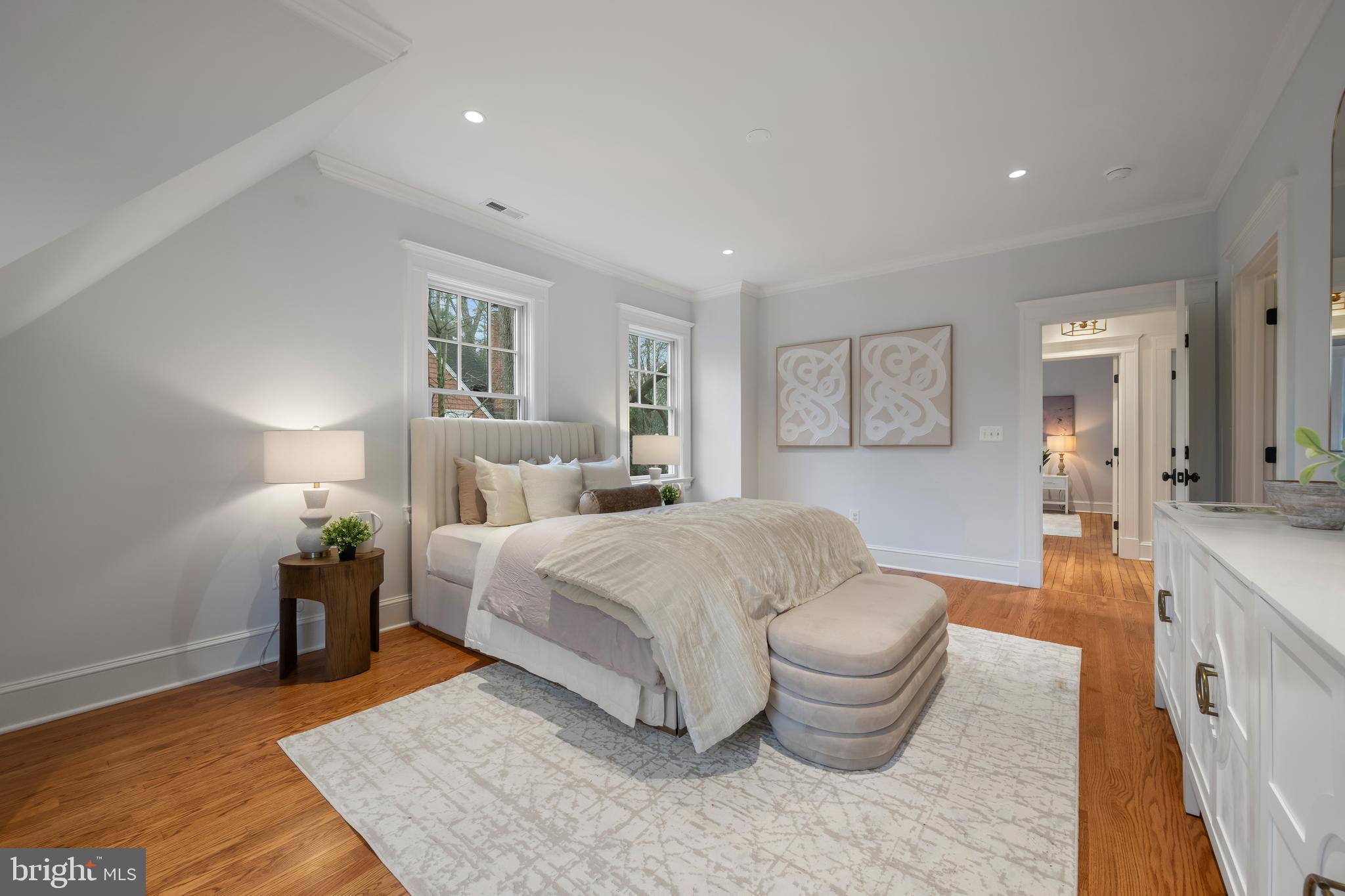 520 Woodlawn Road Baltimore, MD 21210 - Photo 18 of 39 a spacious bedroom with a bed and wooden floor