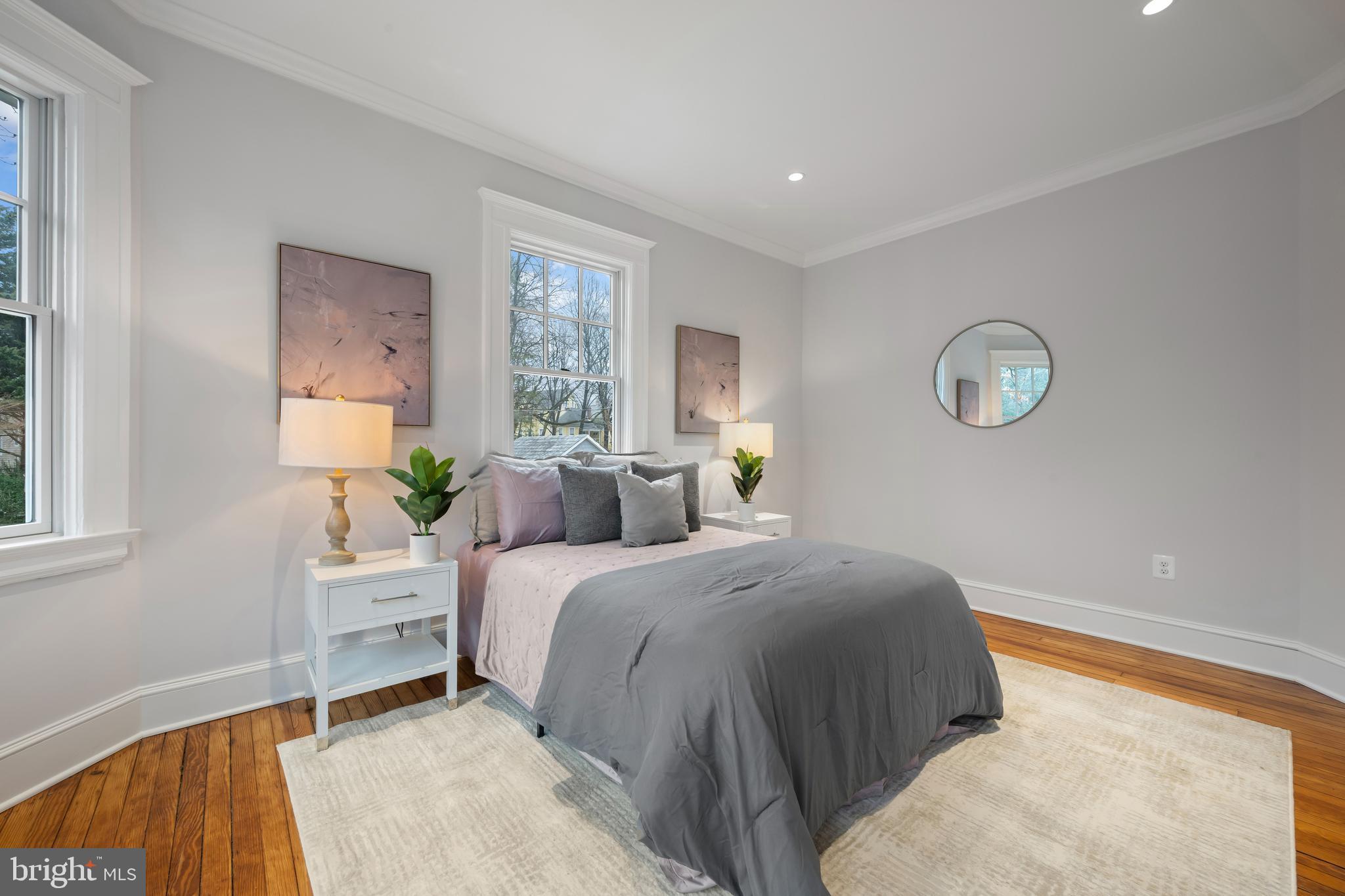 520 Woodlawn Road Baltimore, MD 21210 - Photo 29 of 39 a bedroom with a bed and a window