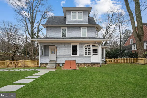 a front view of house with yard
