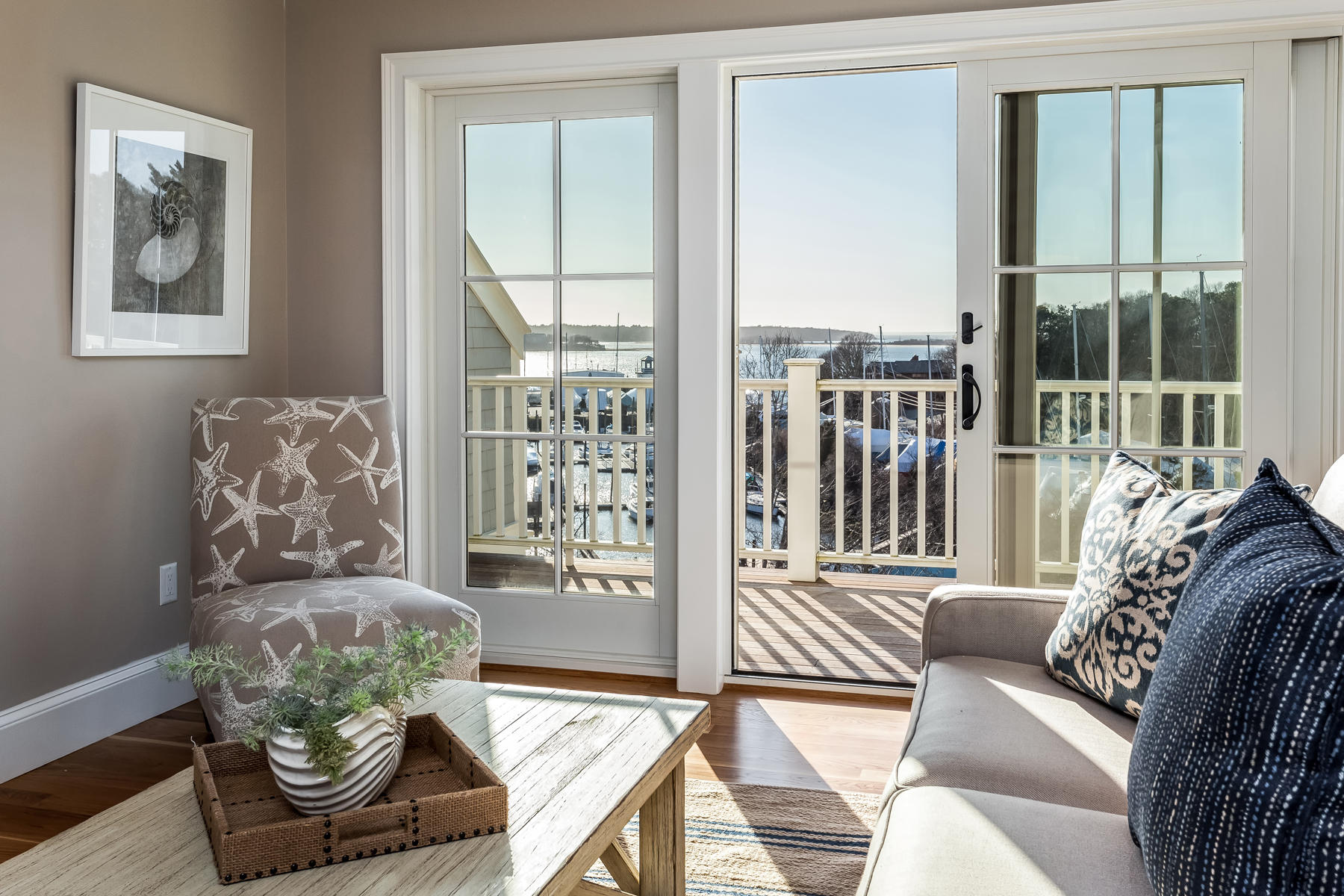 1090 Shore Road, Unit 10 Pocasset, MA 02559 - Photo 13 of 29 a living room with furniture and a large window