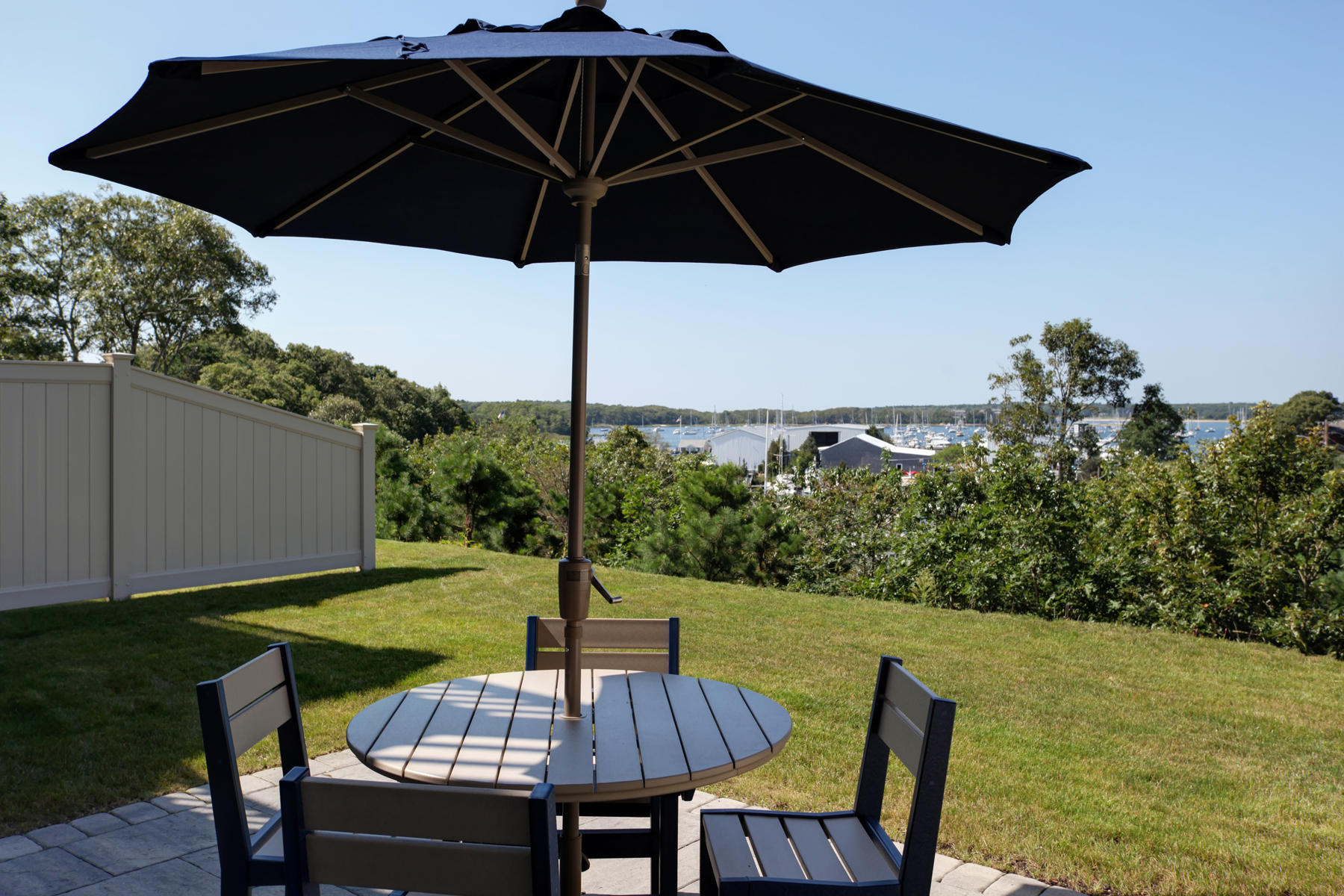 1090 Shore Road, Unit 10 Pocasset, MA 02559 - Photo 28 of 29 a view of an outdoor sitting area with furniture