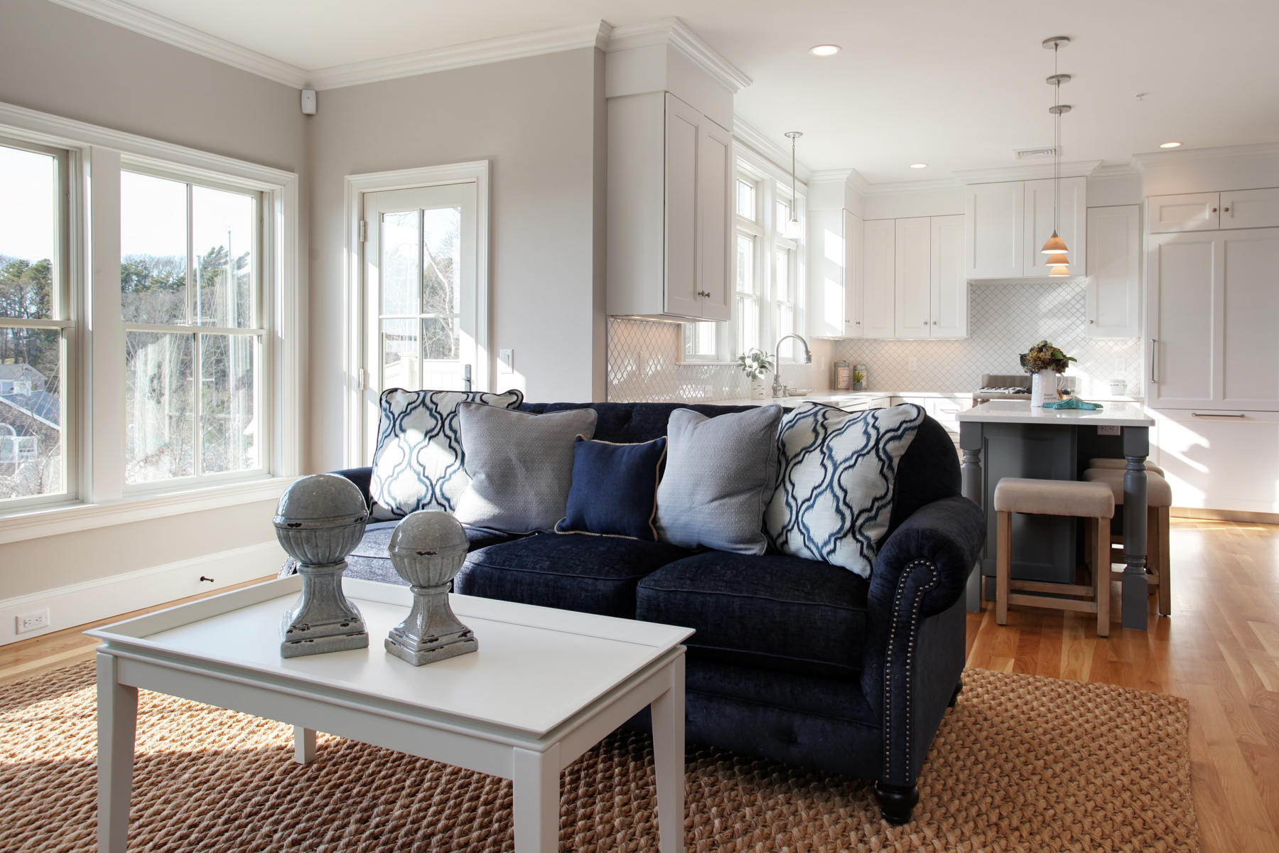 1090 Shore Road, Unit 10 Pocasset, MA 02559 - Photo 5 of 29 a living room with furniture and a large window