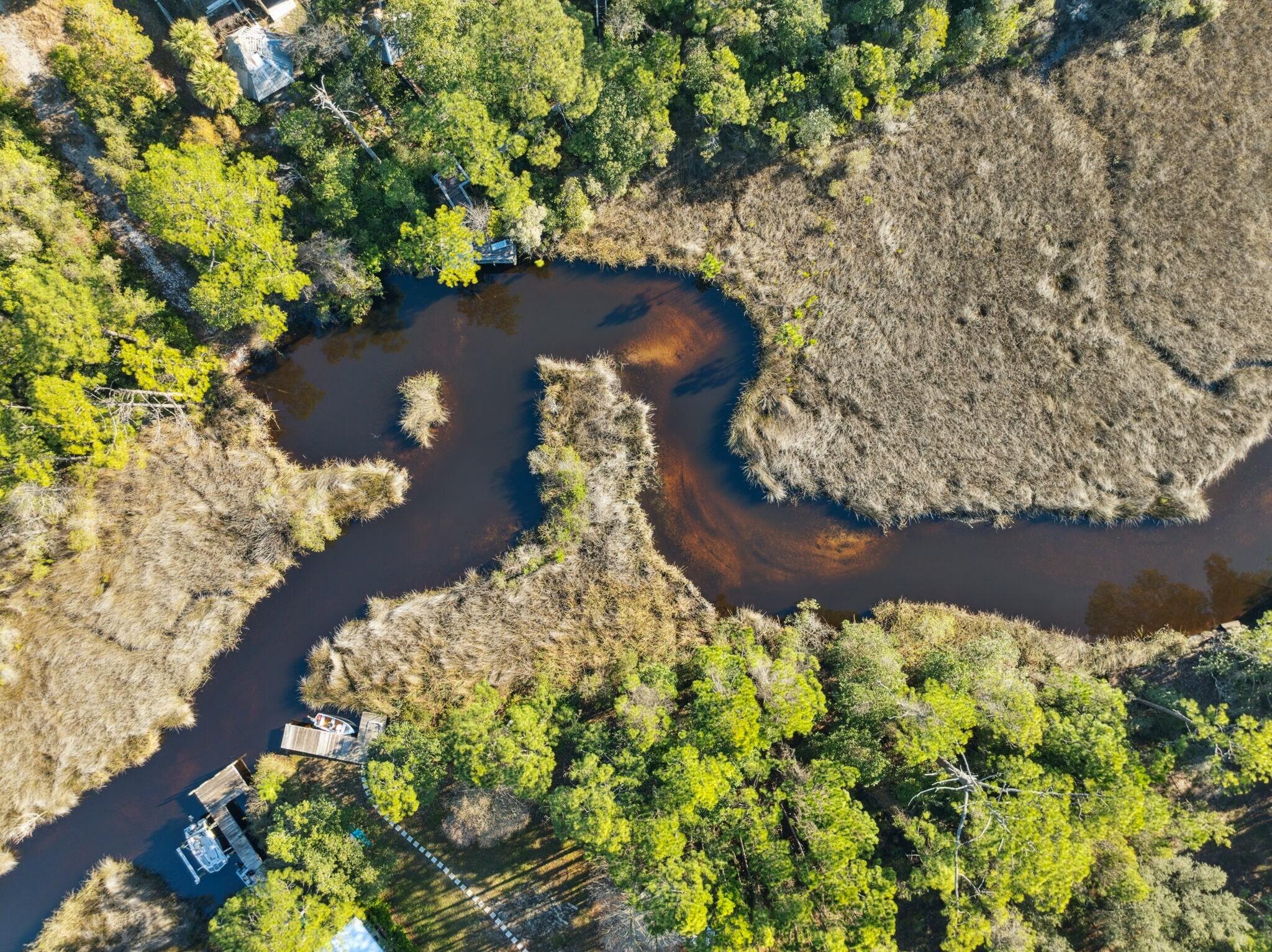 Lot 5 West Shore Dr Inlet Beach Inlet Beach, FL 32461 - Photo 21 of 32 a view of lake from a yard