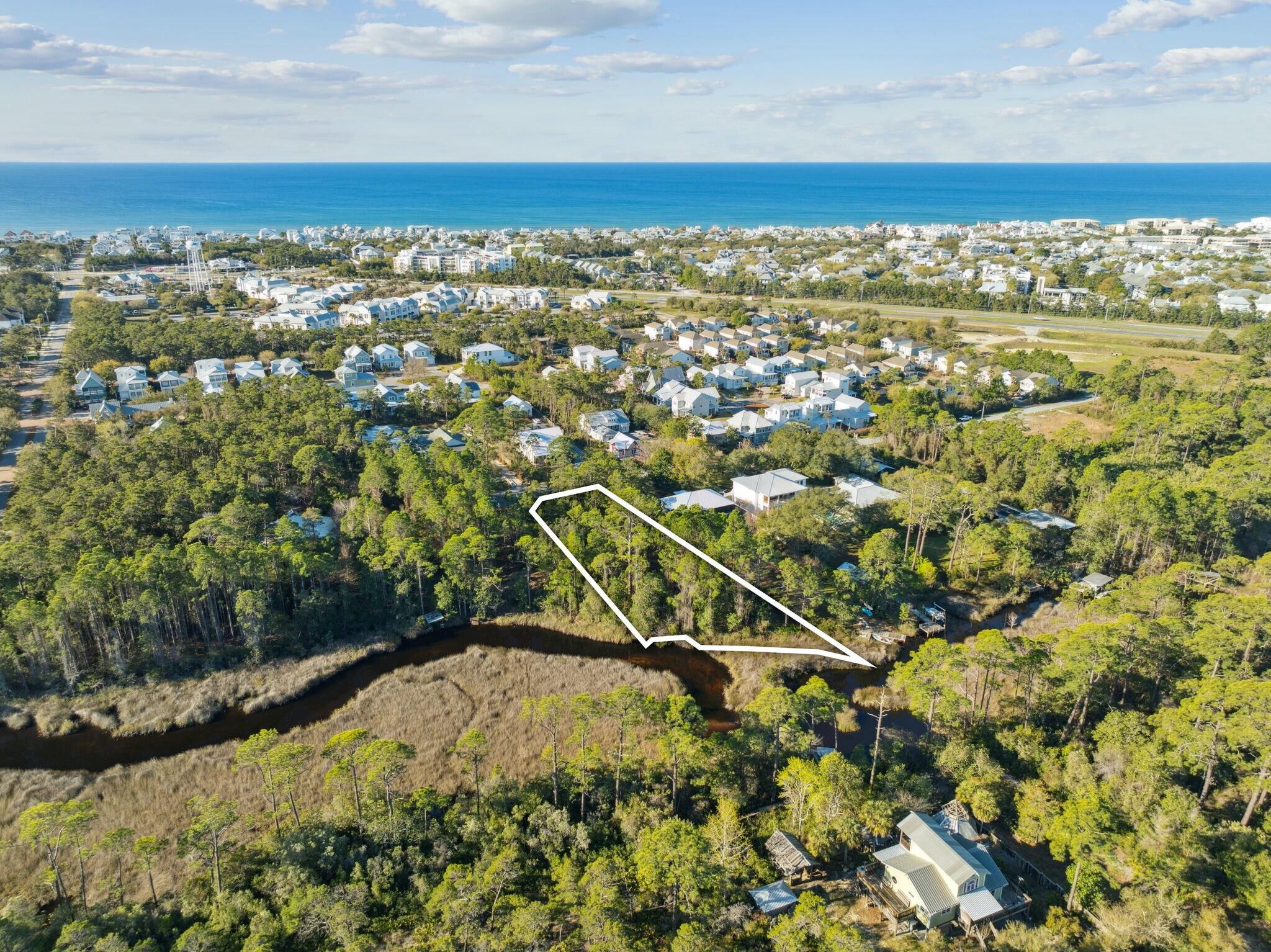 Lot 5 West Shore Dr Inlet Beach Inlet Beach, FL 32461 - Photo 6 of 32 an aerial view of residential houses with outdoor space