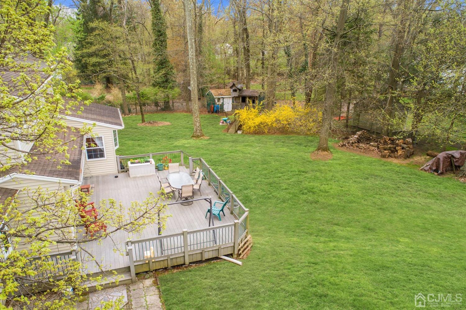 7 Chandler Road Edison, NJ 08820 - Photo 4 of 17 a view of yard with swimming pool and green space
