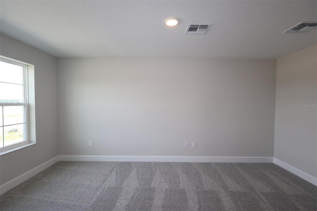 5261 High Line Drive St. Cloud, FL 34771 - Photo 28 of 39 an empty room with a window