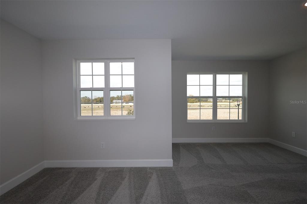 5261 High Line Drive St. Cloud, FL 34771 - Photo 29 of 39 an empty room with a window