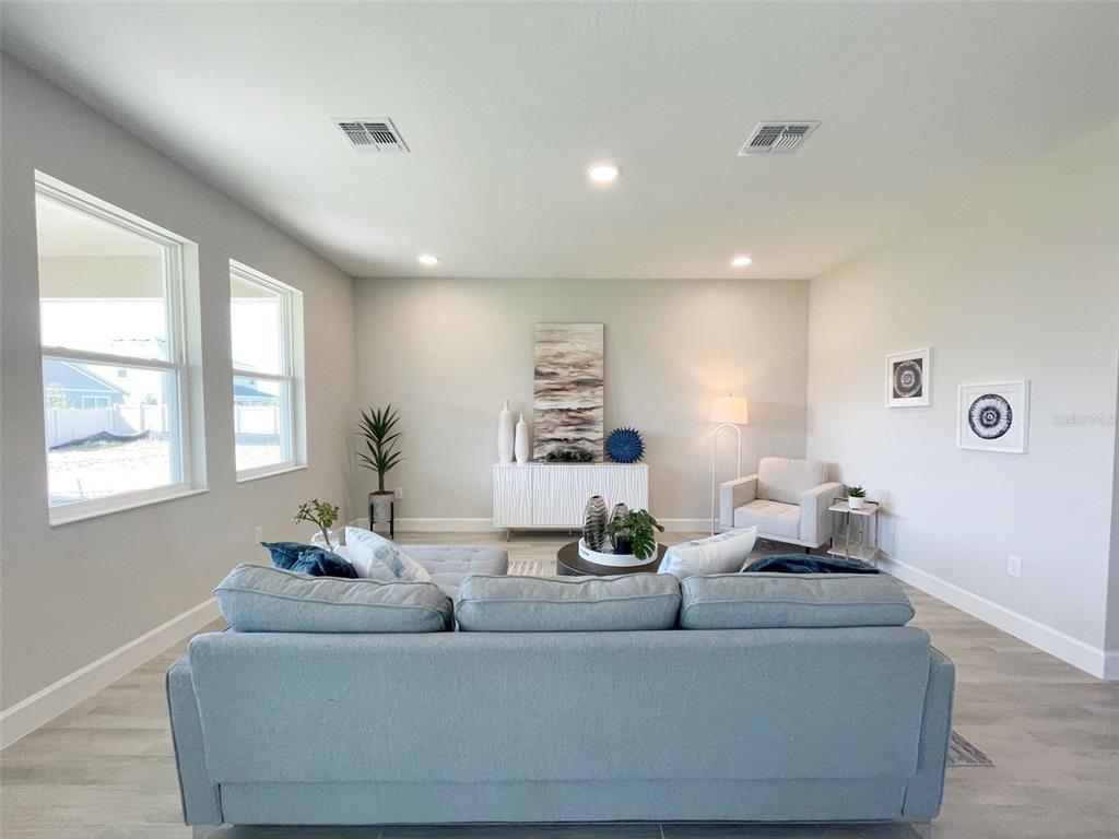 5261 High Line Drive St. Cloud, FL 34771 - Photo 7 of 39 a living room with furniture and window