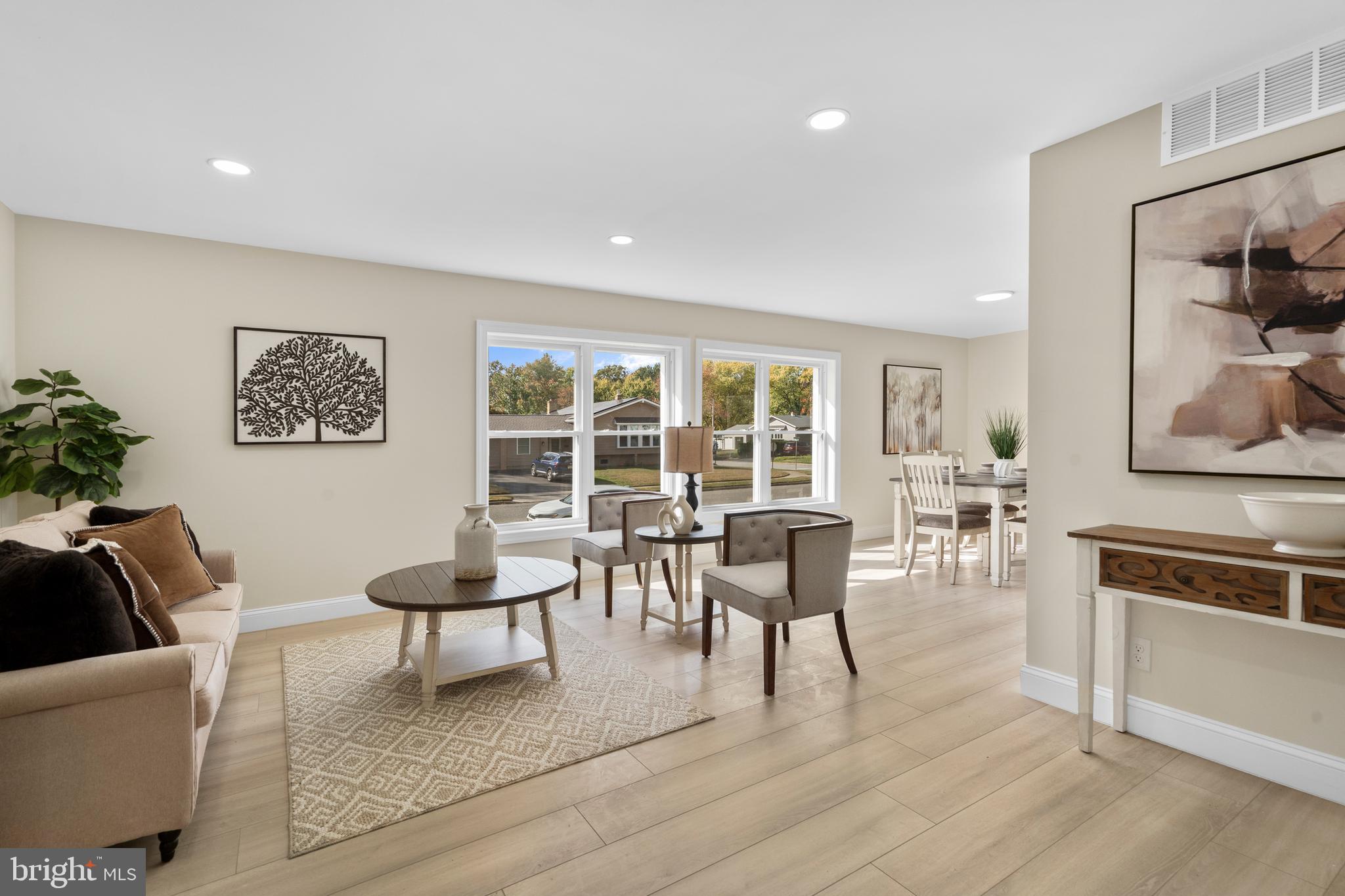120 Canterbury Road Mount Laurel, NJ 08054 - Photo 15 of 46 a living room with furniture and a flat screen tv with kitchen view