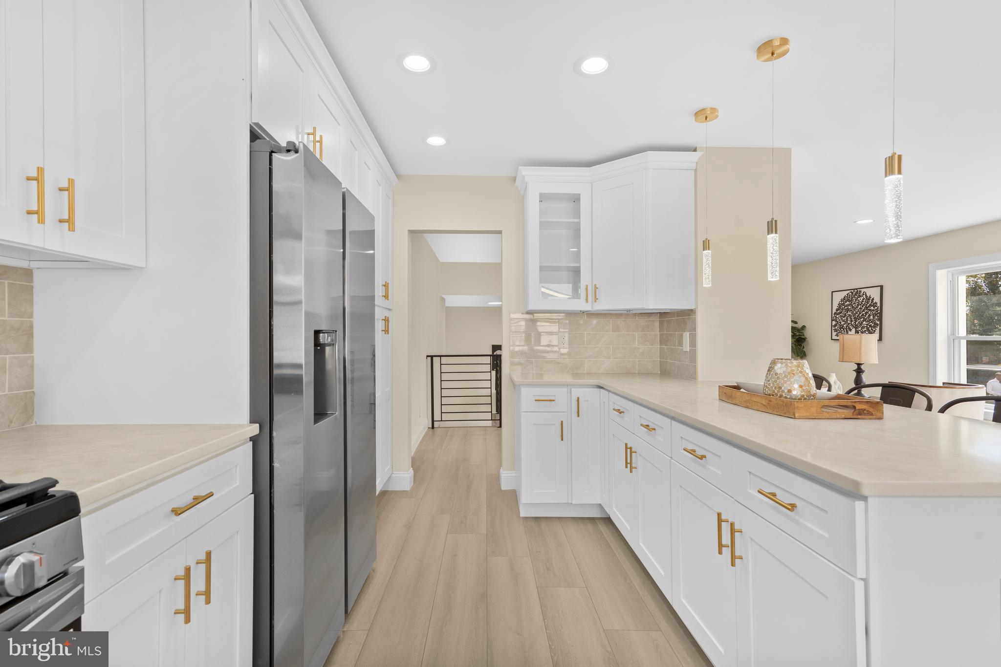 120 Canterbury Road Mount Laurel, NJ 08054 - Photo 9 of 46 a kitchen with a sink refrigerator and cabinets