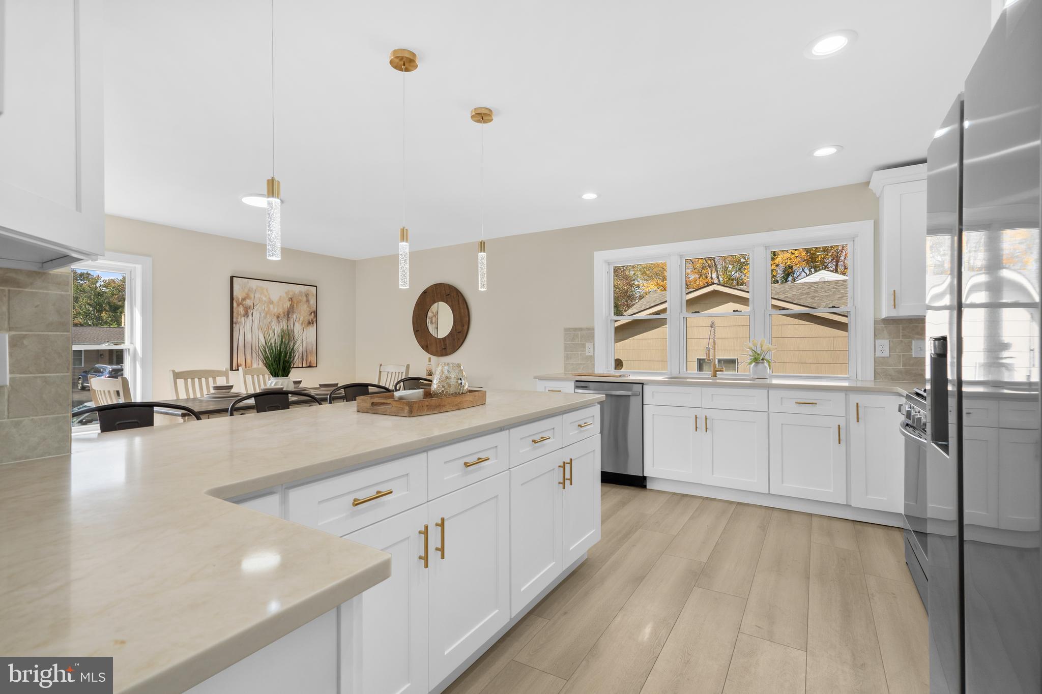 120 Canterbury Road Mount Laurel, NJ 08054 - Photo 10 of 46 a large kitchen with a lot of counter space and wooden floor