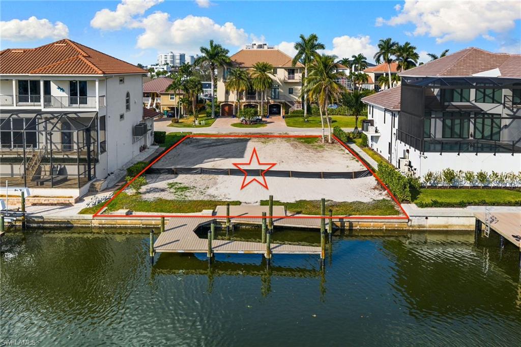 418 Seagull Avenue Naples, FL 34108 - Photo 15 of 36 a view of swimming pool with outdoor seating