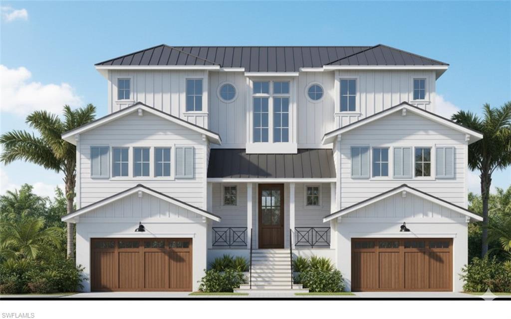 418 Seagull Avenue Naples, FL 34108 - Photo 31 of 36 a front view of a house with a yard and garage