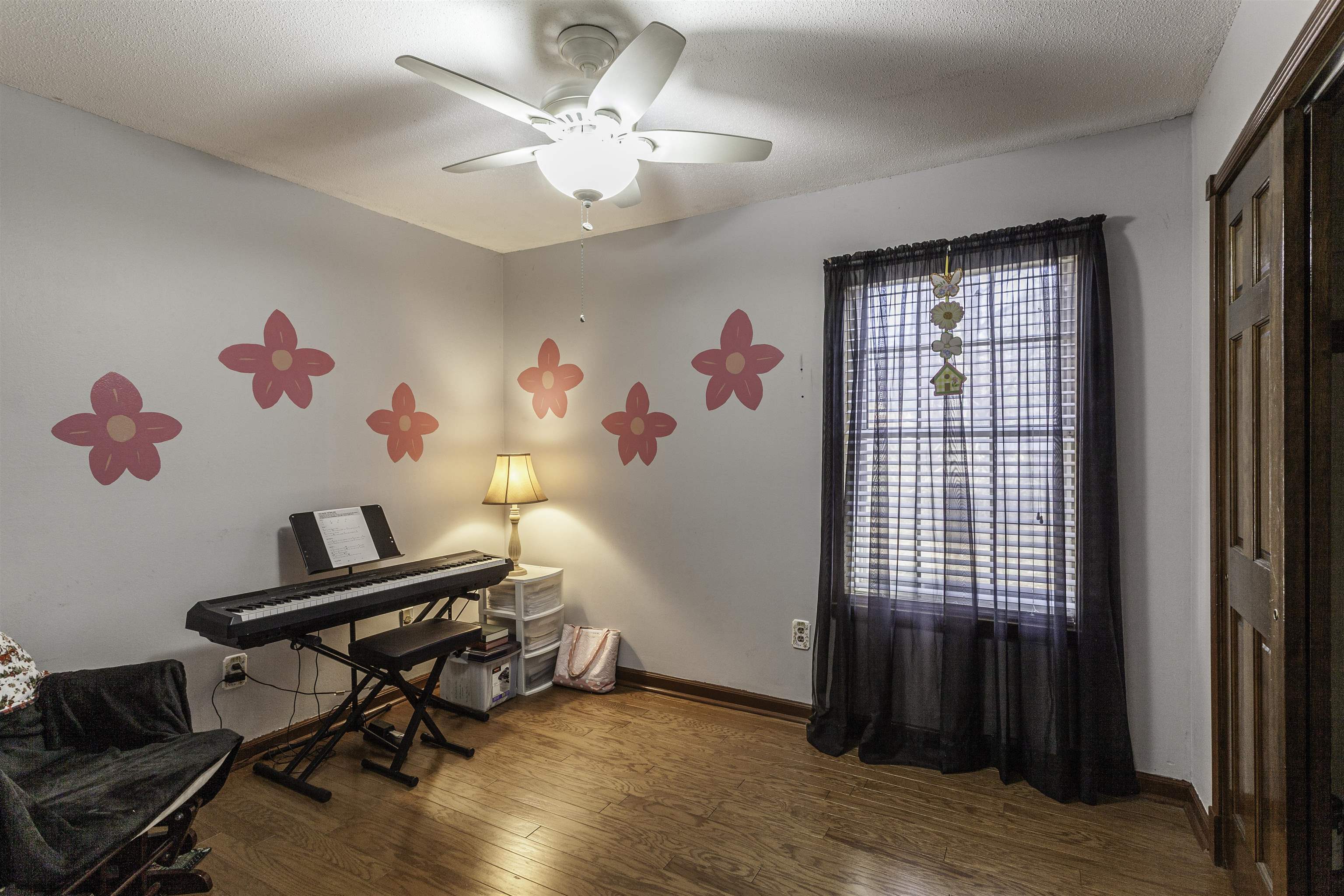 3462 Fox Meadows Road Memphis, TN 38115 - Photo 19 of 23 a view of a workspace with furniture and a window