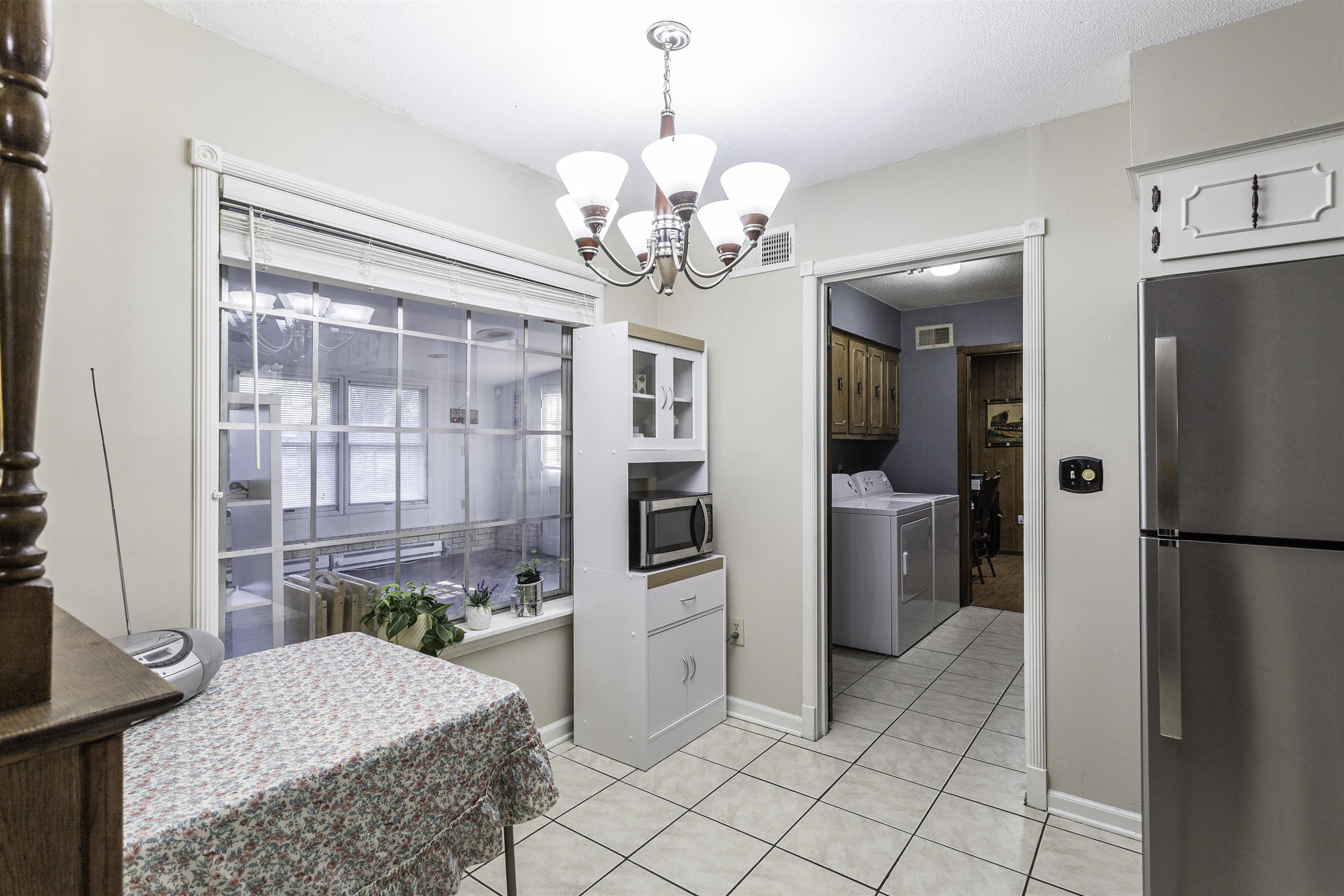 3462 Fox Meadows Road Memphis, TN 38115 - Photo 10 of 23 a kitchen with stainless steel appliances granite countertop a refrigerator a oven a sink and dishwasher