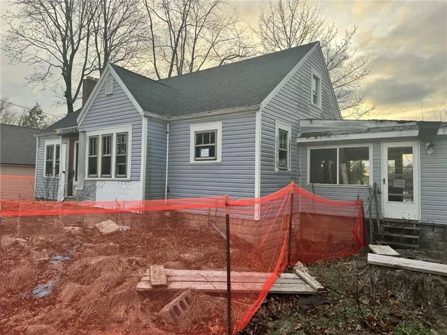 a backyard of a house with seating space