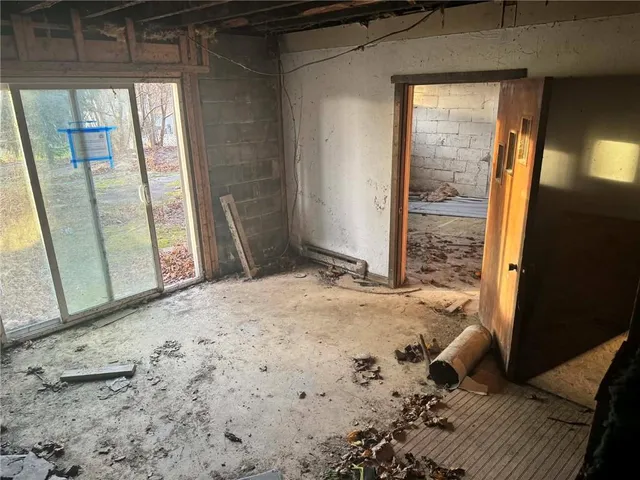 a view of entryway with wooden floor