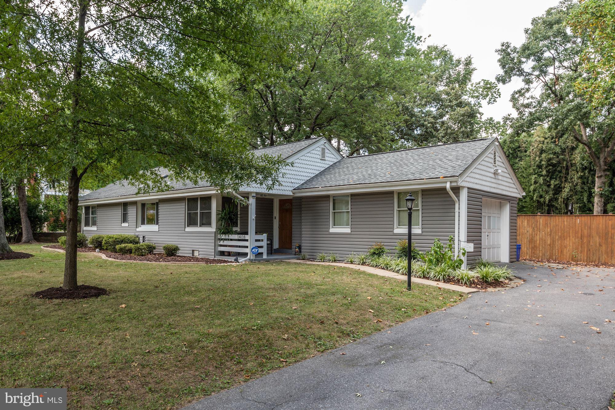 1408 Stateside Drive Silver Spring, MD 20903 - Photo 2 of 17 Driveway with attached, side entrance garage