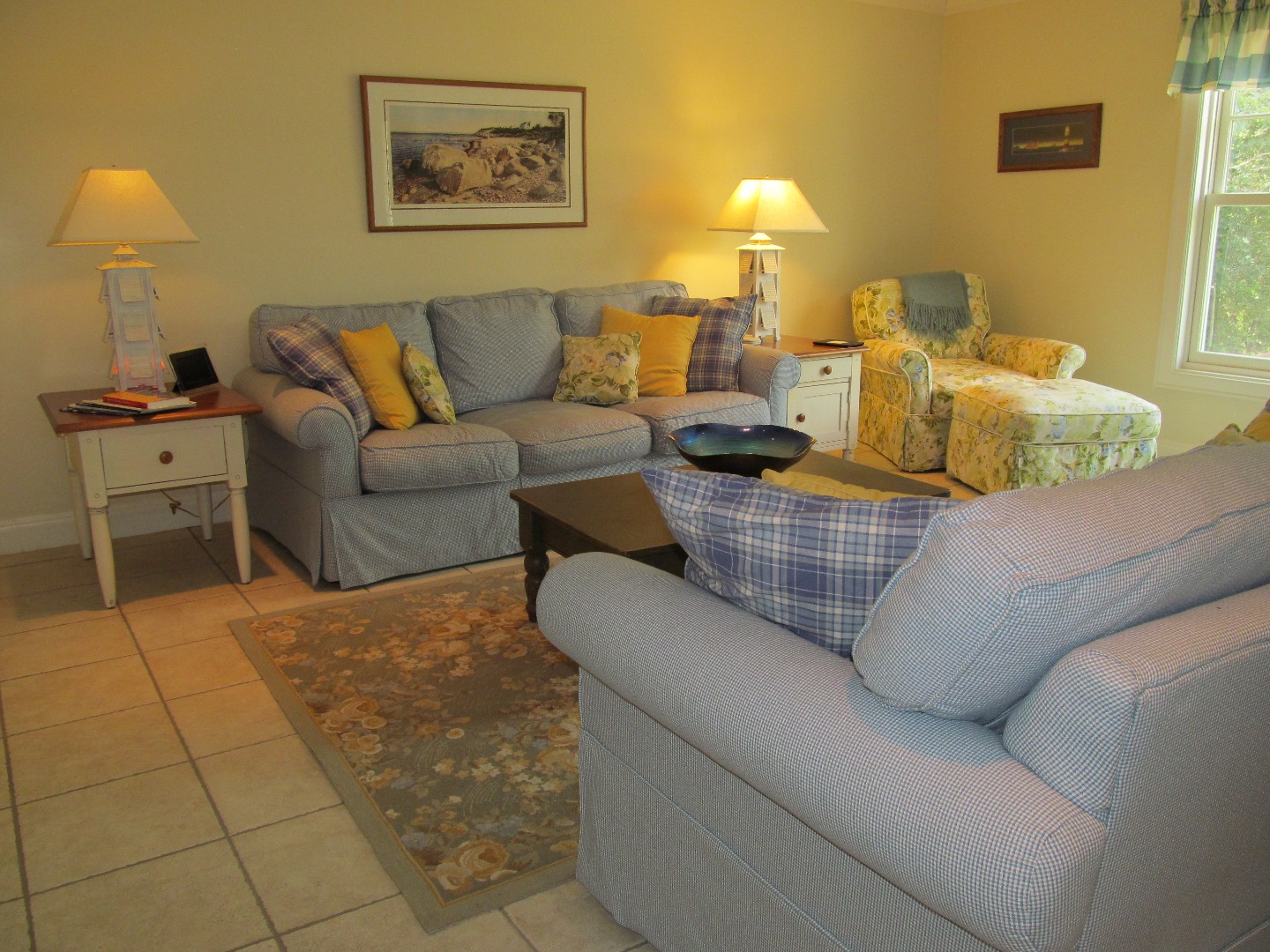 109 Herring Creek Road Edgartown, MA 02539 - Photo 4 of 16 a living room with furniture and a lamp