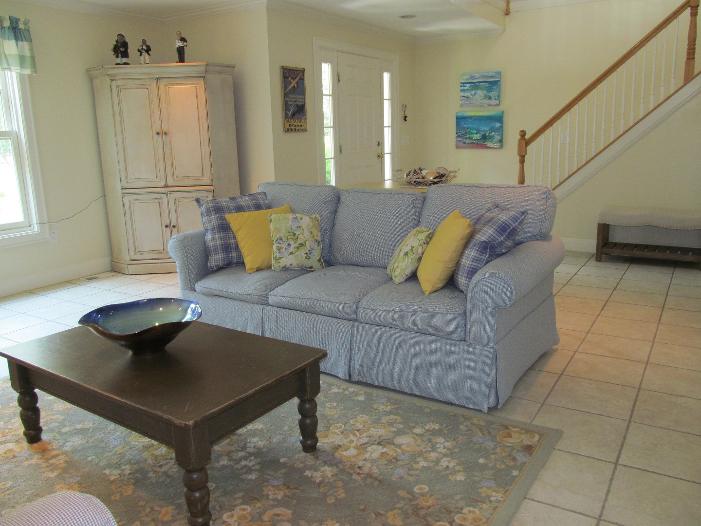 109 Herring Creek Road Edgartown, MA 02539 - Photo 5 of 16 a living room with furniture and a rug