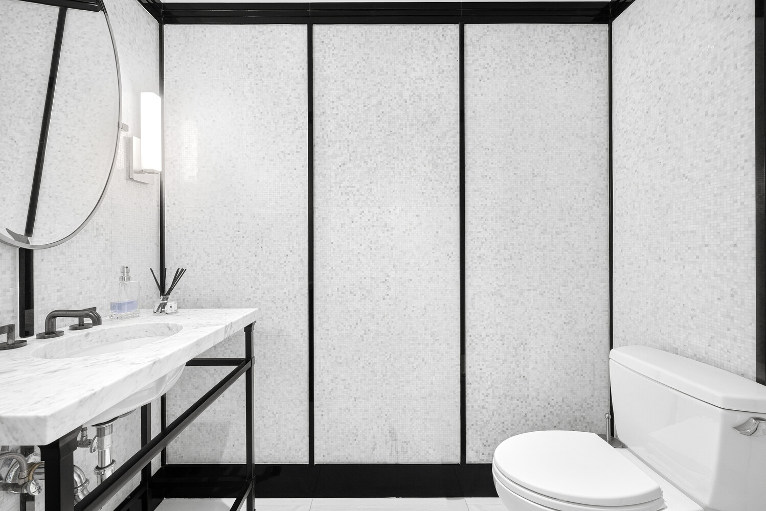50 West 30th Street, Unit 18B Manhattan, NY 10001 - Photo 9 of 10 a bathroom with a sink a toilet and shower