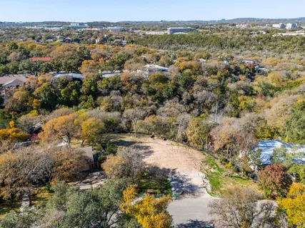 a view of a city with mountains in the background