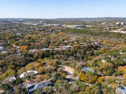 an aerial view of a city with lots of residential buildings