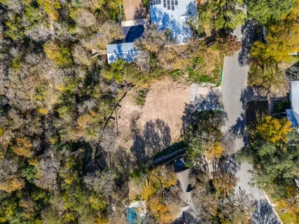 a view of a forest from a balcony