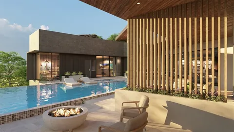 a view of a swimming pool with outdoor seating