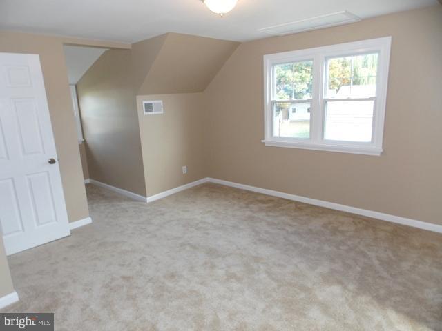 2402 Roth Road Edgewood, MD 21040 - Photo 14 of 27 an empty room with windows and closet