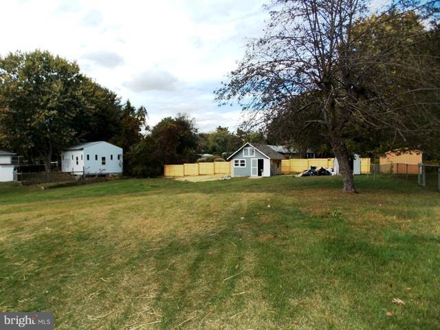 2402 Roth Road Edgewood, MD 21040 - Photo 22 of 27 a view of a house with a yard