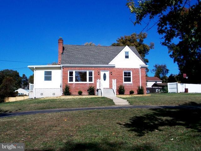 2402 Roth Road Edgewood, MD 21040 - Photo 10 of 27 a front view of a house with a garden