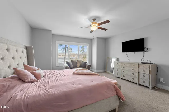 a bathroom with a shower and toilet
