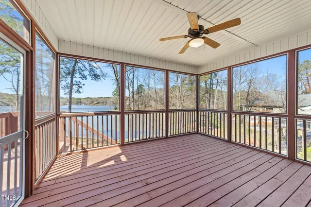 an aerial view of a houses with ocean view