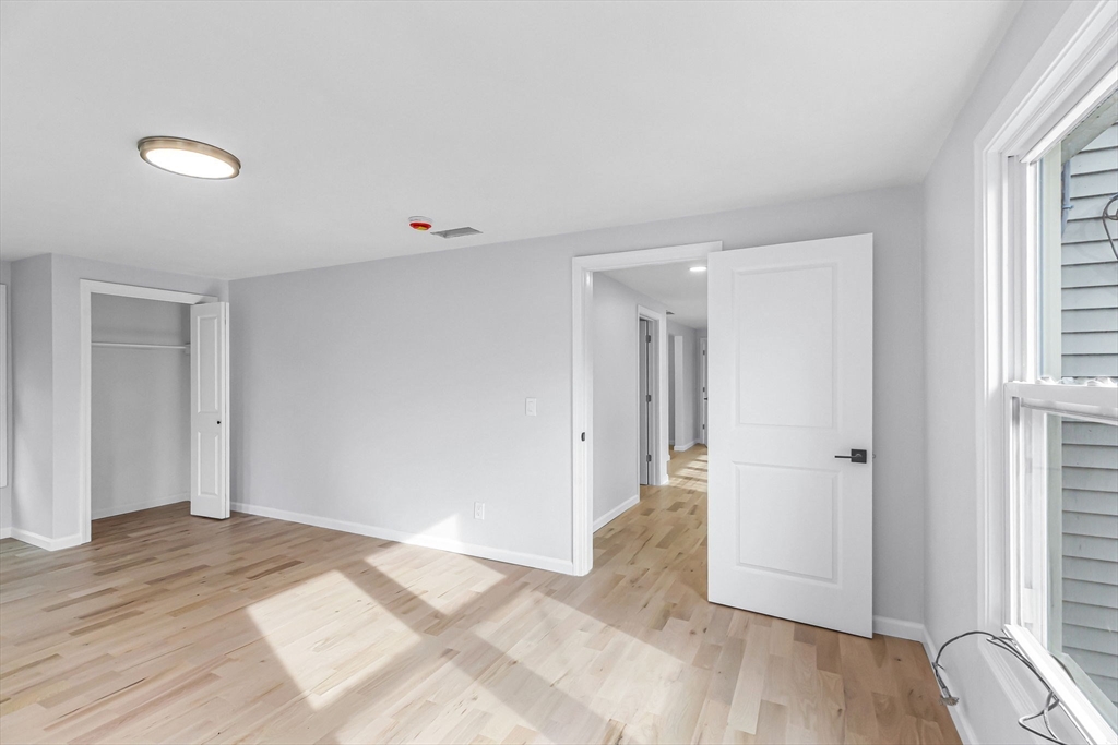 143 James Street Ludlow, MA 01056 - Photo 22 of 41 a view of a room with wooden floor and windows