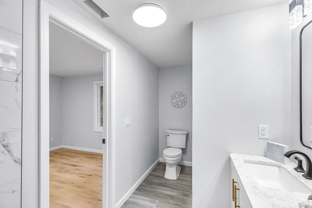143 James Street Ludlow, MA 01056 - Photo 28 of 41 a bathroom with a sink and a toilet