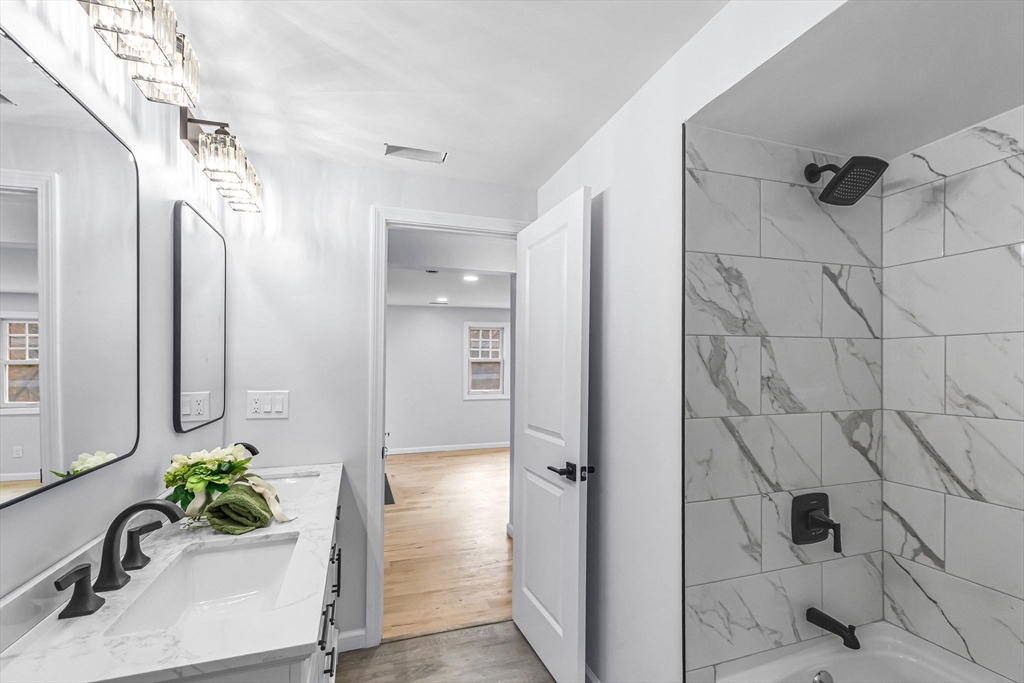 143 James Street Ludlow, MA 01056 - Photo 32 of 41 a bathroom with a sink and a mirror