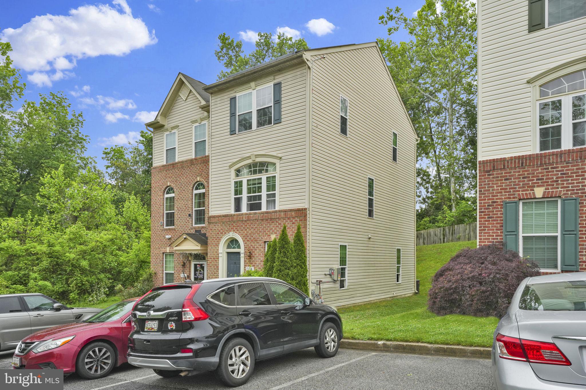 7138 Station House Road Elkridge, MD 21075 - Photo 4 of 42 a car parked in front of a house