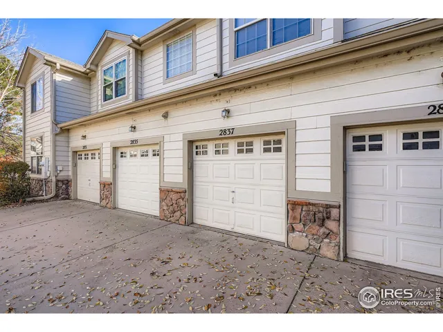 a view of a house with a garage