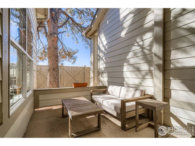 a bench sitting in front of a building