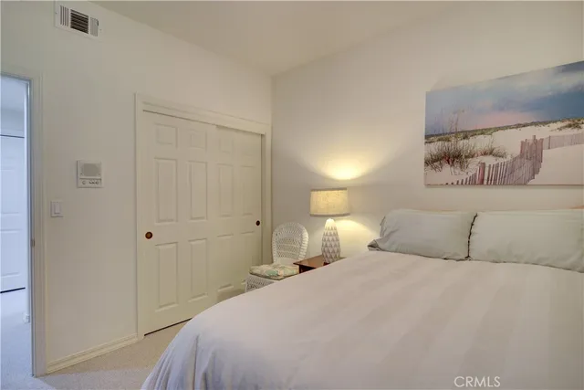 a view of a hallway with windows