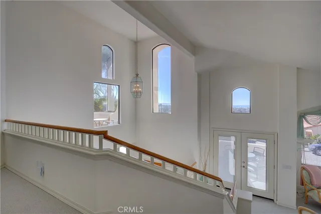 a bathroom with a tub a sink and mirror