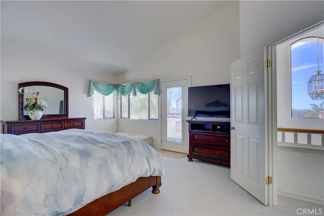 a view of a chairs and table in the balcony