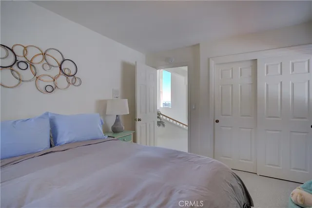 a front view of a house with a garden and a yard